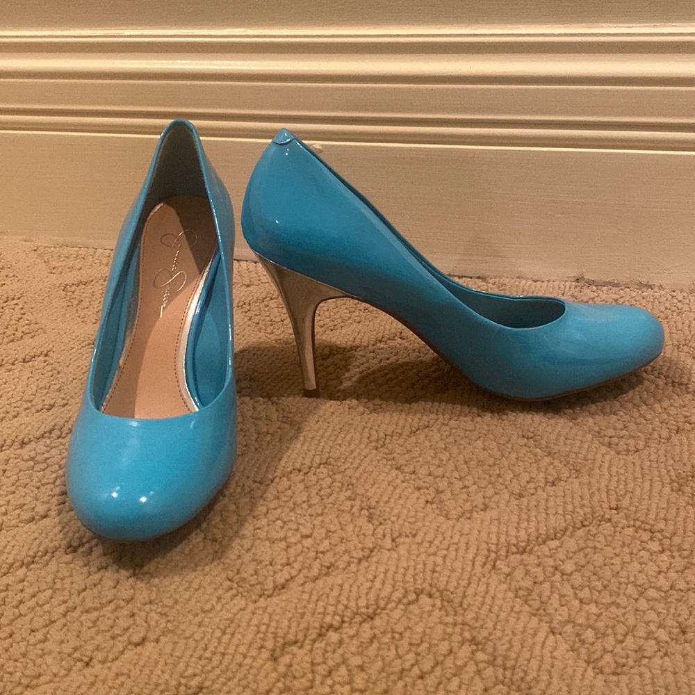 Blue Jessica Simpson pumps with a silver heel. Worn once! Size 9